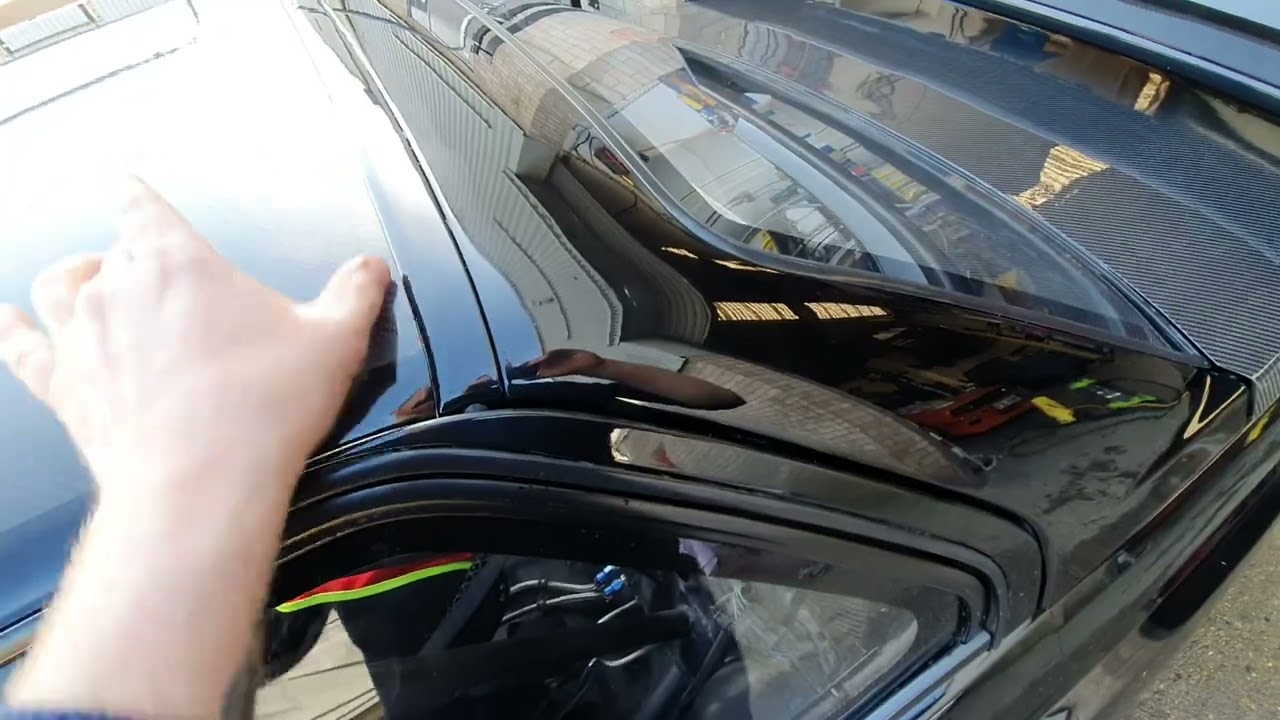 BMW e30 m3 carbon fiber roof installed on an original m3