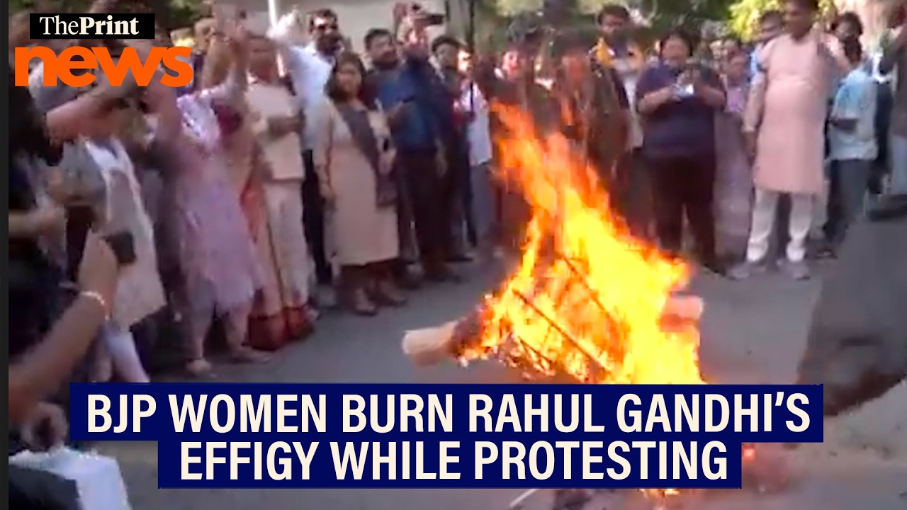 BJP women workers burn Rahul Gandhi's effigy during their protest march to his residence
