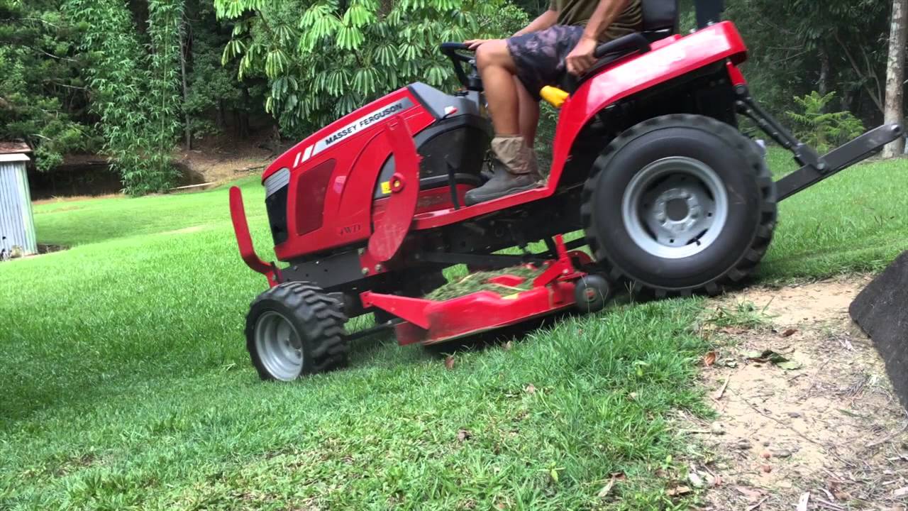 Mowing with a Massey Ferguson GC 1705 Pt1