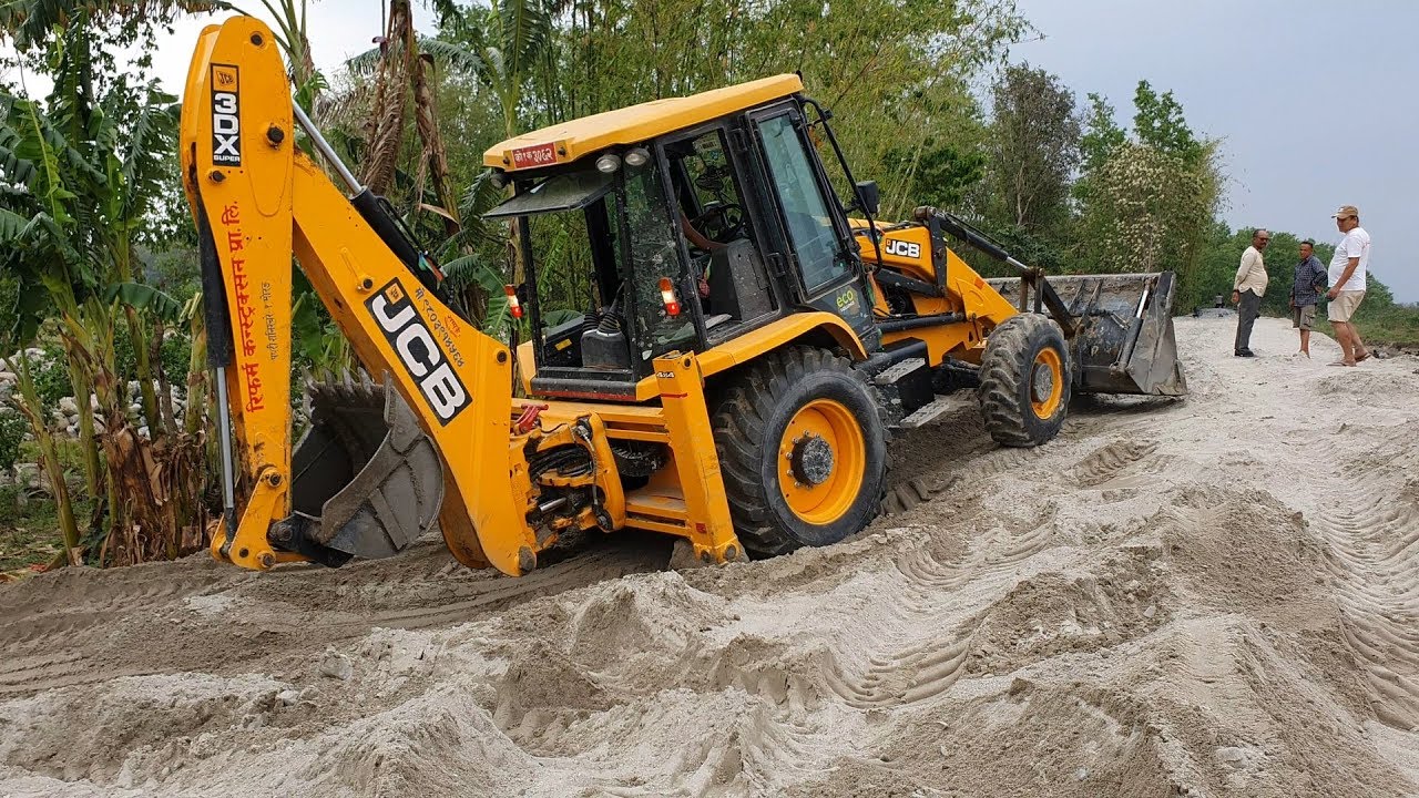 JCB Backhoe Working on Sandy Place - JCB video