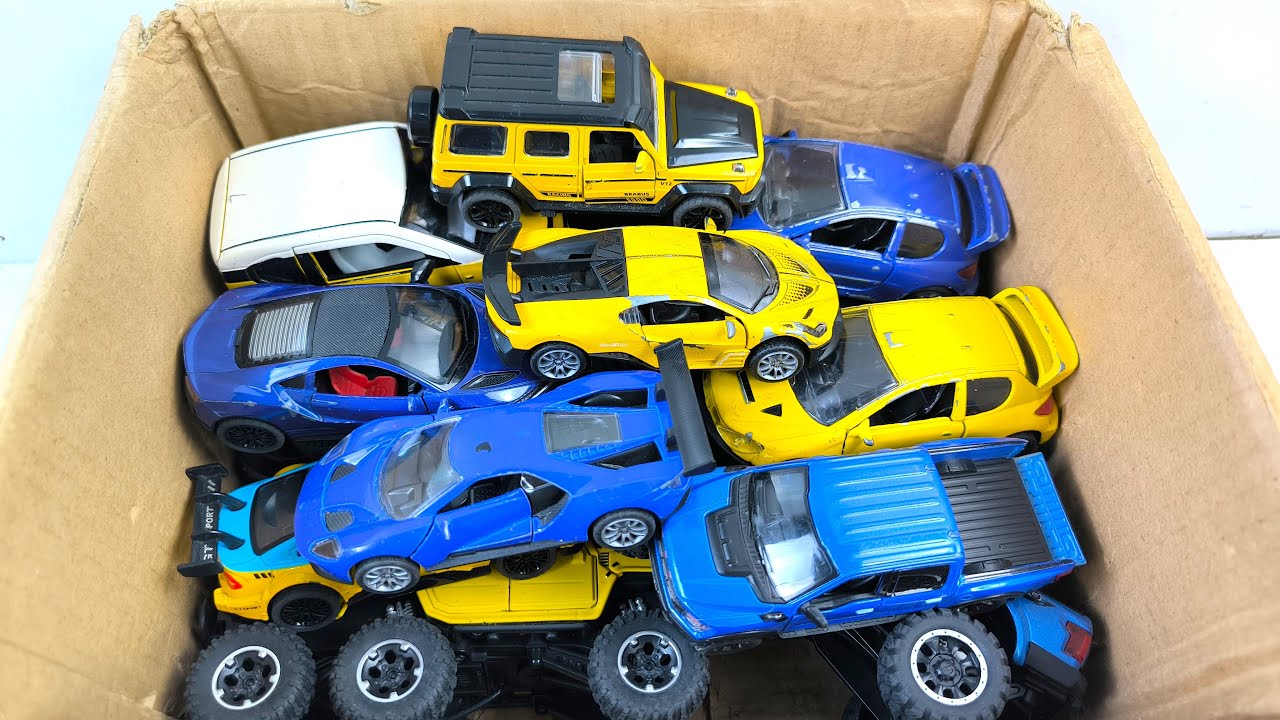 Box Full of Model Cars -Mazda Mx5, Koenigesgg Jesko, Lamborghini Scv12, Byd Yang Wang U8, Toyota Car