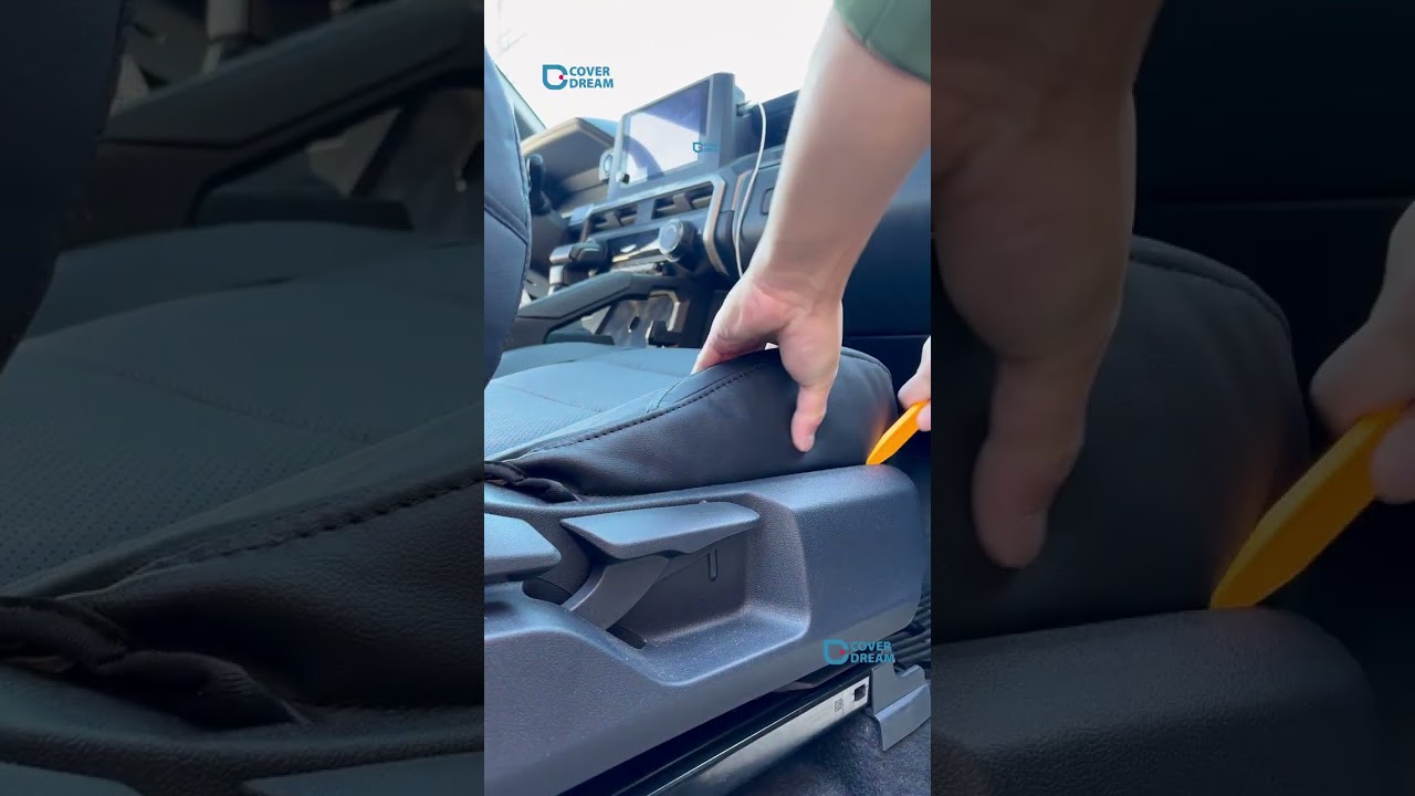 CoverDream custom black seat cover for Toyota Tacoma installing