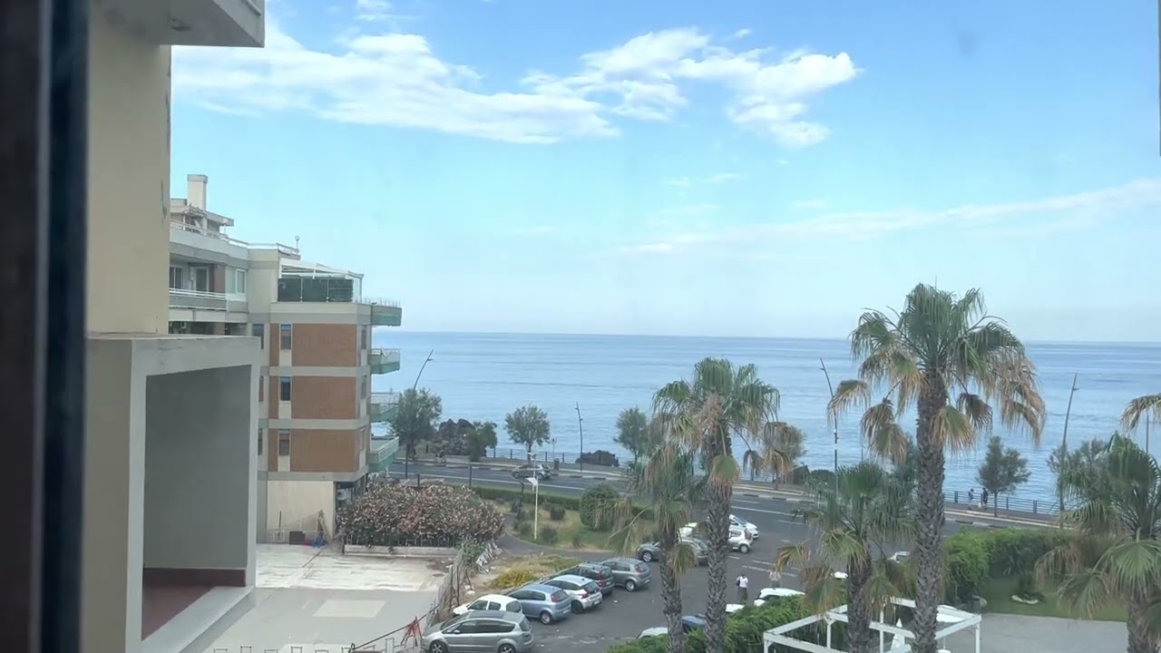 Cool Mosanghini traction glass elevator at Hotel Nettuno in Catania, Italy