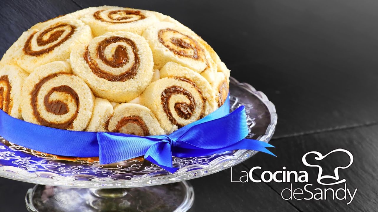 Torta de Pionono con Merengue Chocolate Dulce de Leche Nata y Fresa