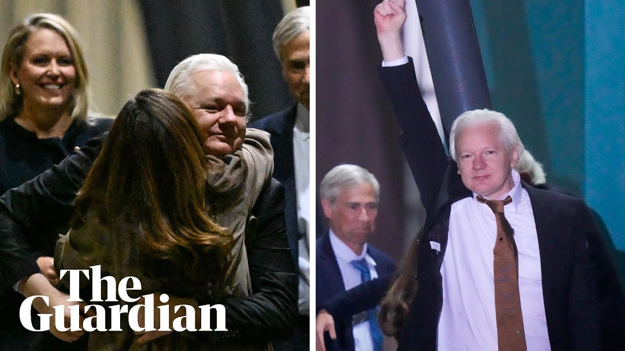 Moment Julian Assange gets off plane as he arrives in Australia