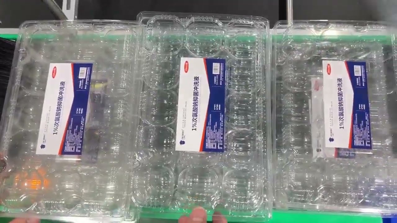 Transparent egg trays sticker applicator equipment