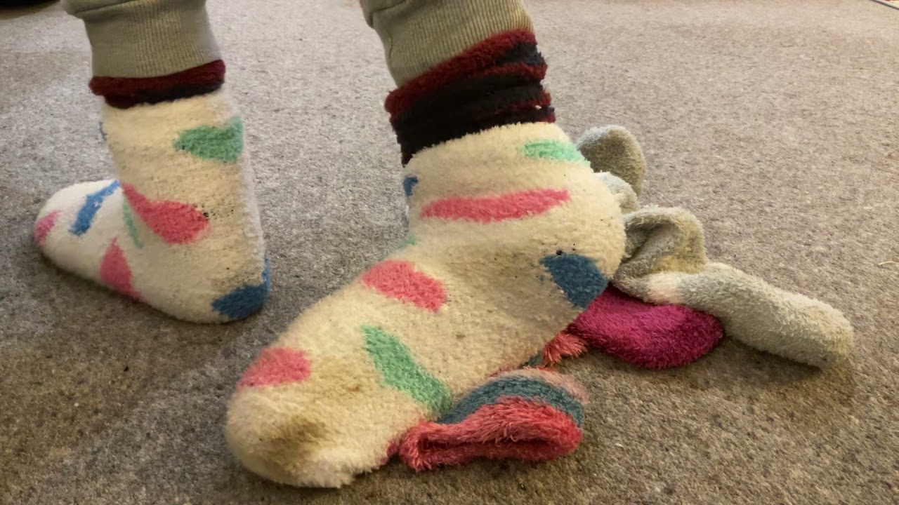 My new fuzzy socks with some worn pairs on top