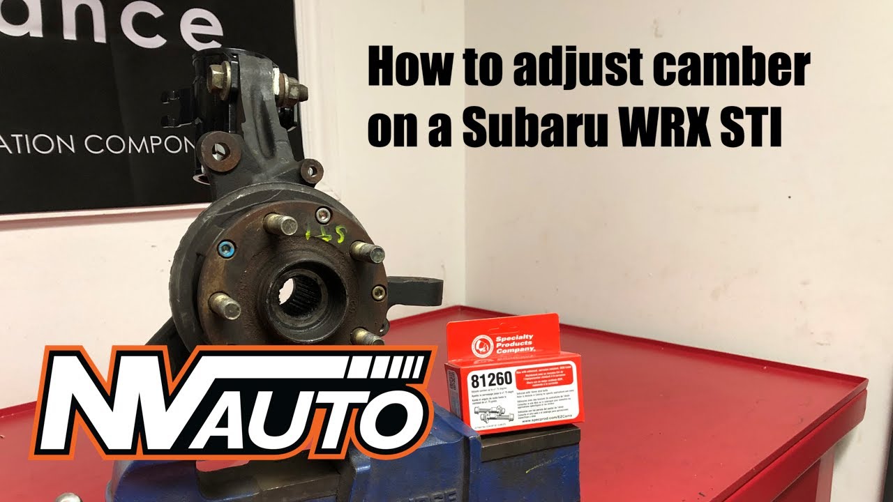 How to adjust camber and install camber bolts on a MacPherson strut car