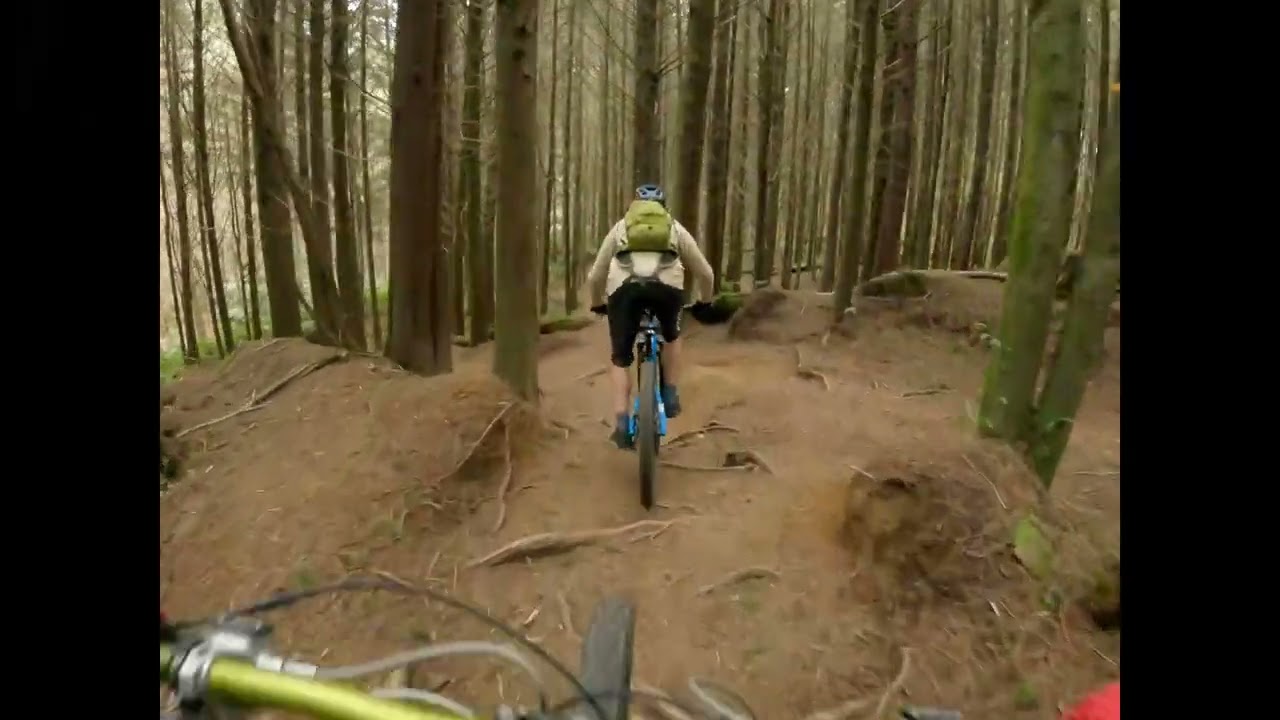 Chasing Lewis down Grinder, Rotorua, New Zealand, MTB