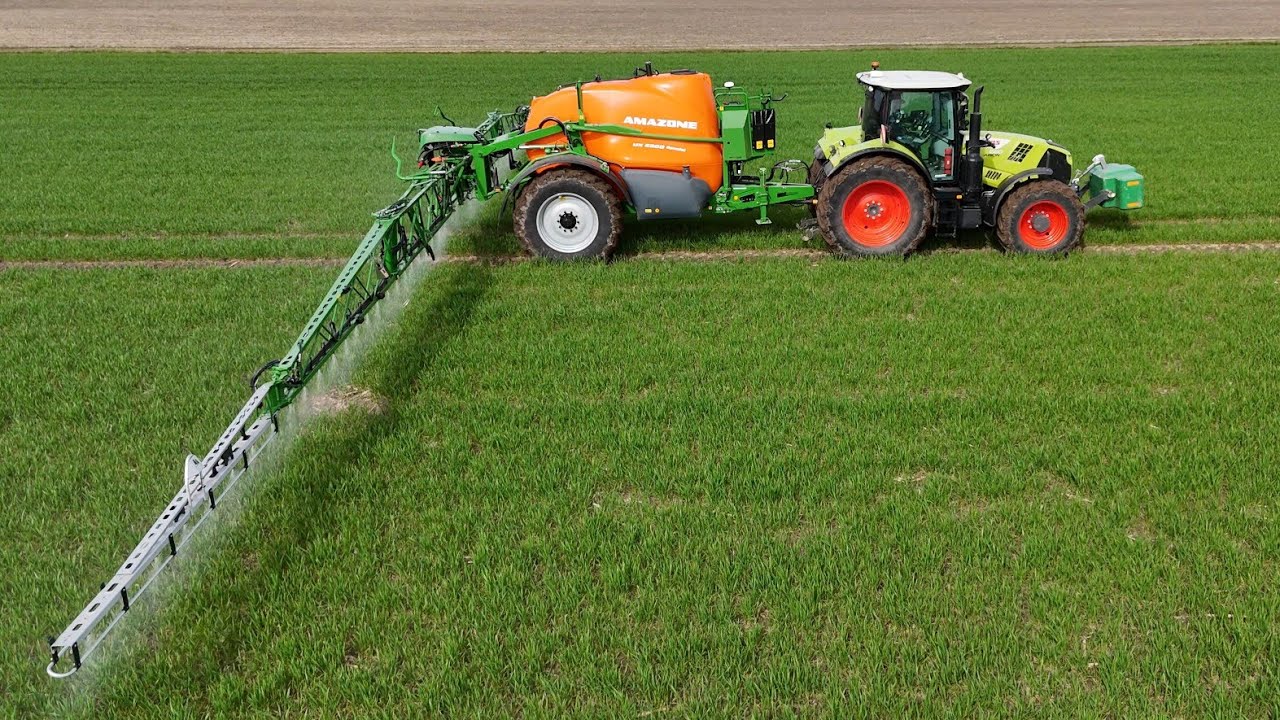 CLAAS ARION 660 mit AMAZONE UX 5200 Special Feldspritze / 4K