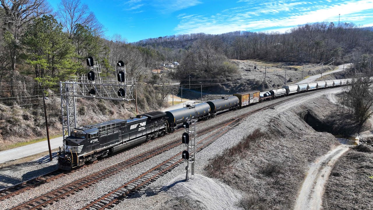 Norfolk Southern 168 with 1 up front & 1 on the rear thru Oakdale Tennessee 