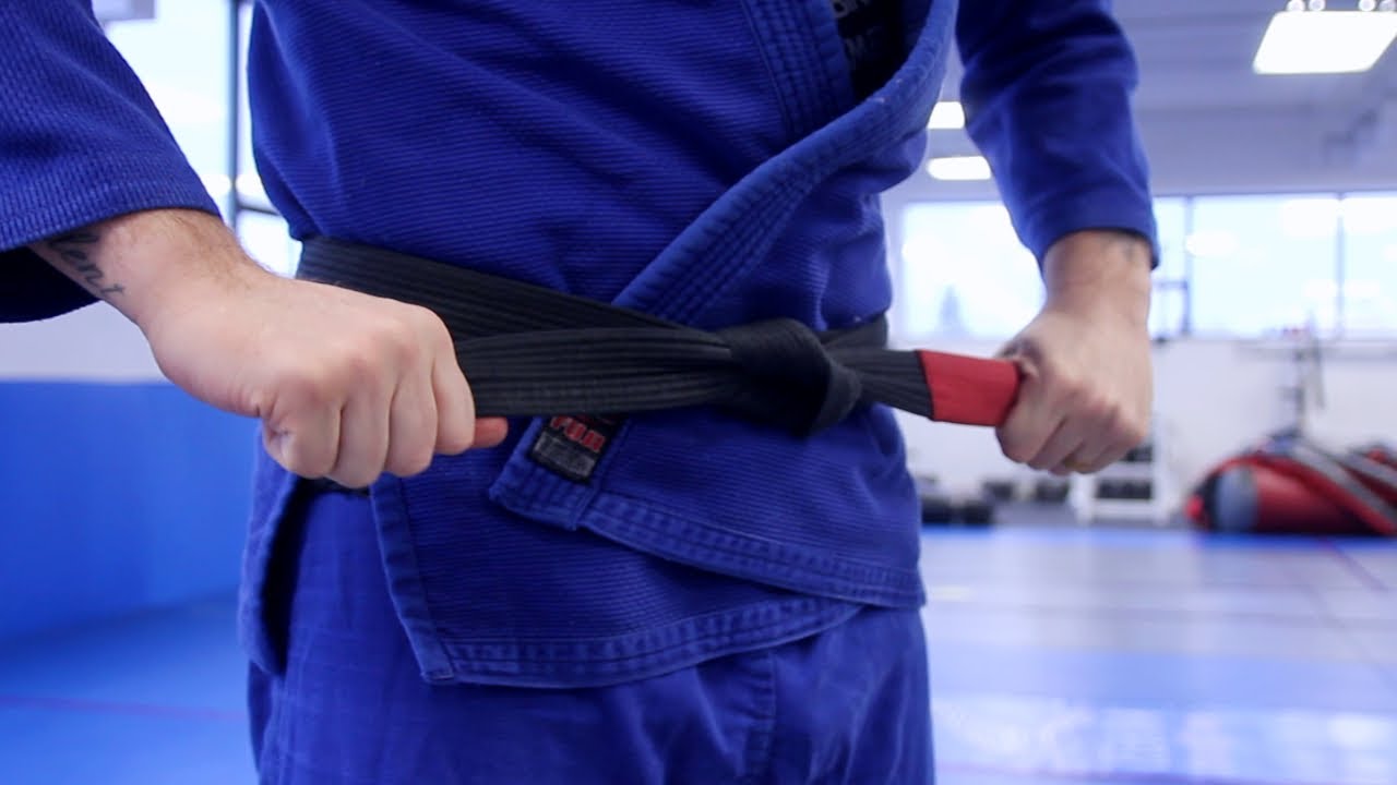 BJJ black belt ROLLING with purple belt