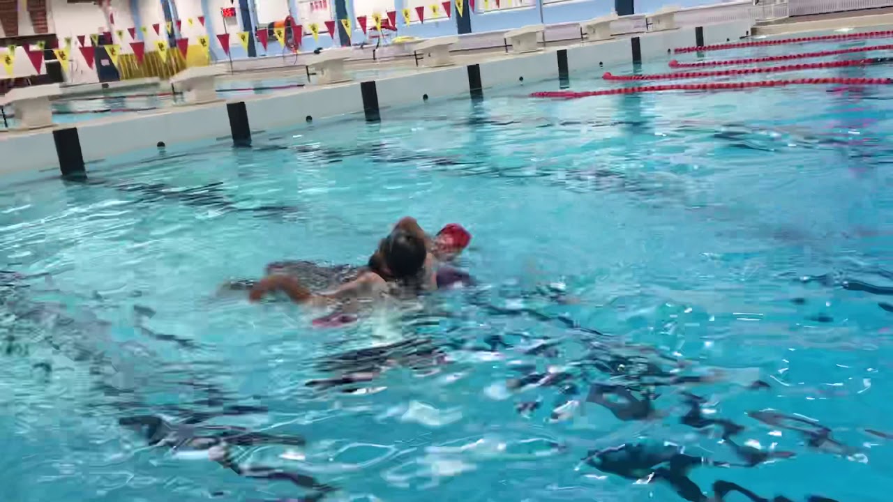 Conscious drowning person rear rescue with rescue tube. Example #2