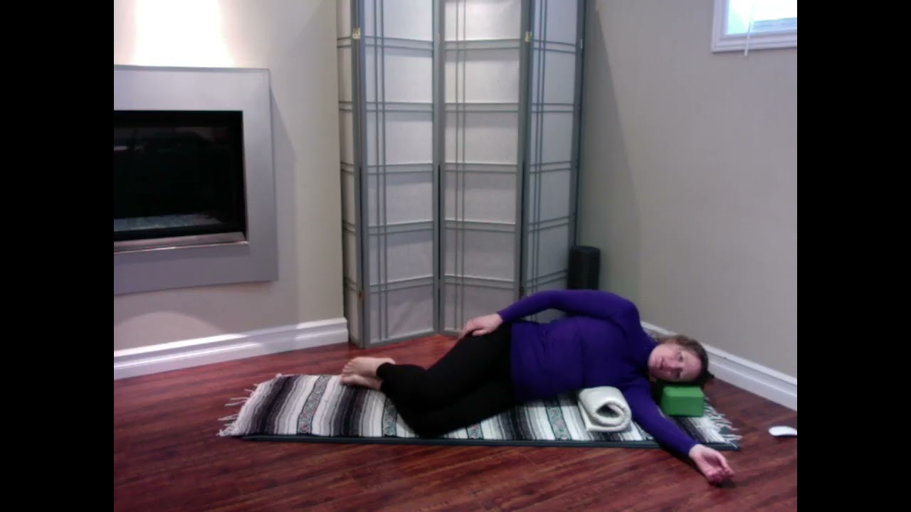 Side lying over a roll - ribs