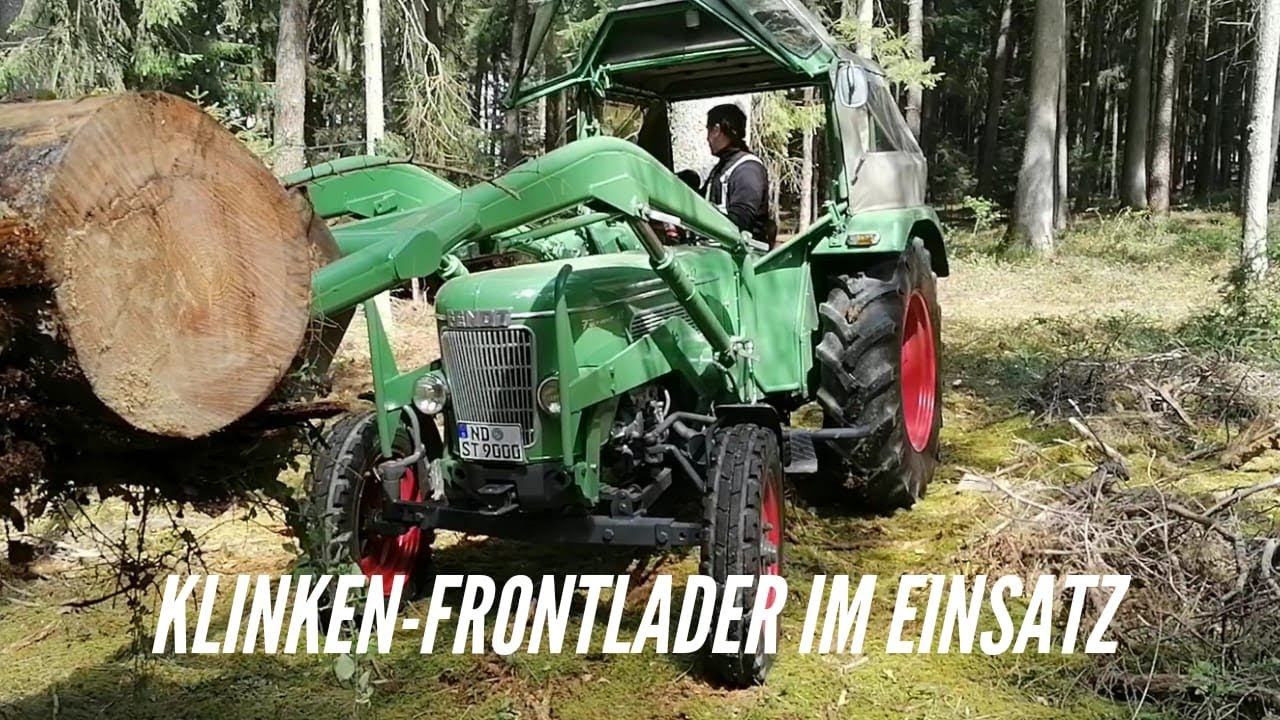 Klinkenfrontlader fordert Anhänger - Maßarbeit bei der Baumfällung - elektro. 14 Tonnen Spalter 1m