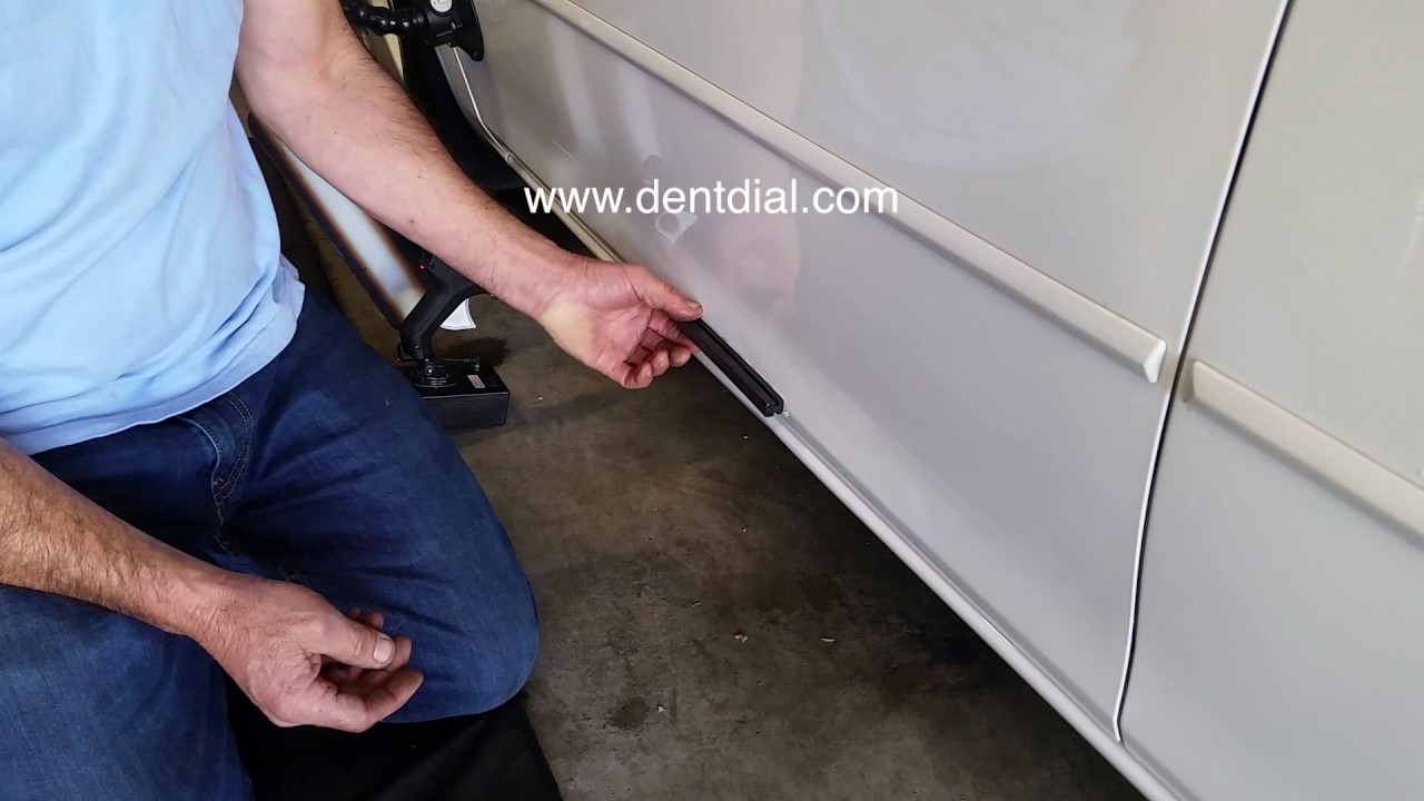 Loc-On™ Glue puller rocking a rocker panel