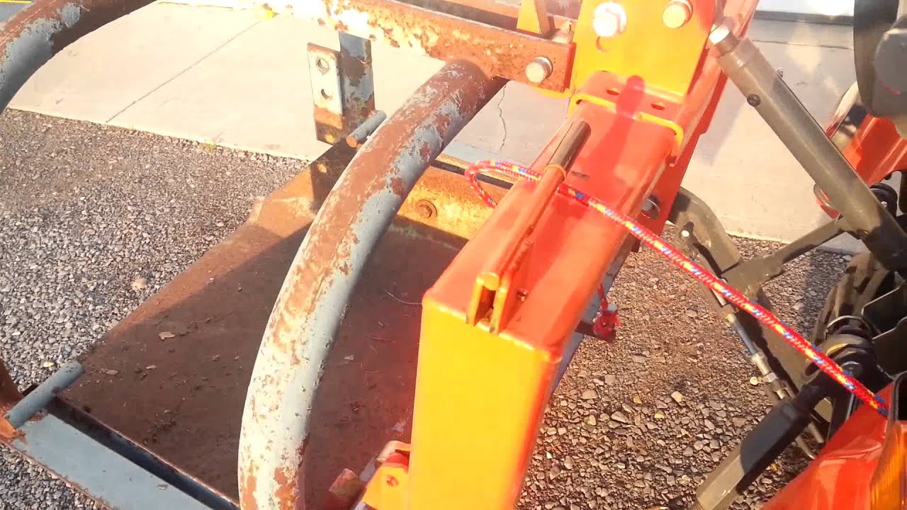Kubota BX Using Dirt Scoop