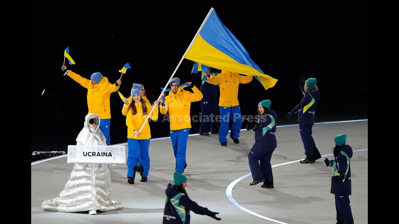 Russian woman carried Ukraine placard at Winter Olympics opening ceremony in show of support