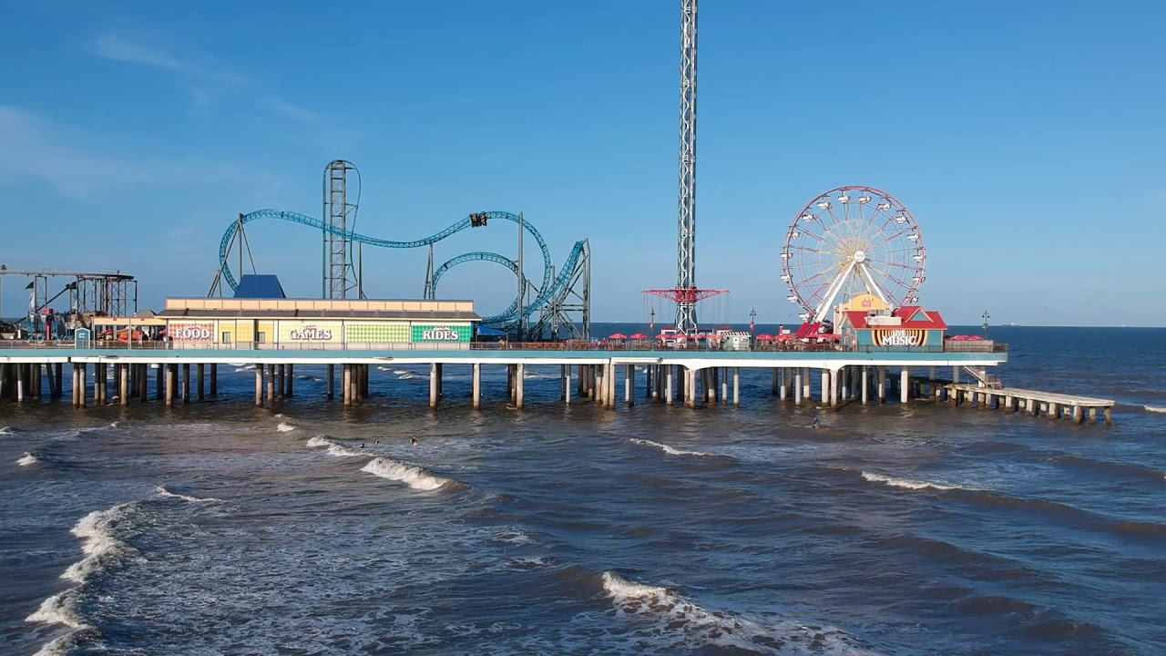 Galveston, Tx...Seawall and Pleasure Pier Aerial views.