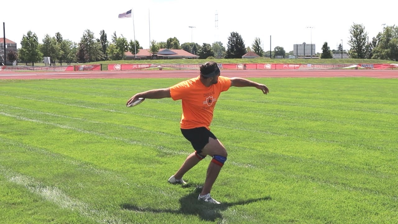 Slow Motion Discus Stand Throw