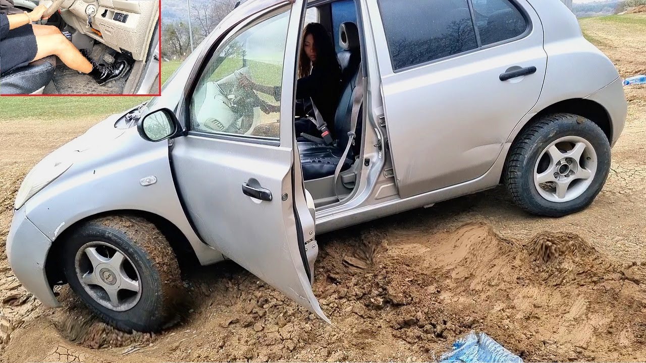 how to get car out of mud front wheel drive/ car get stuck in mud nissan micra