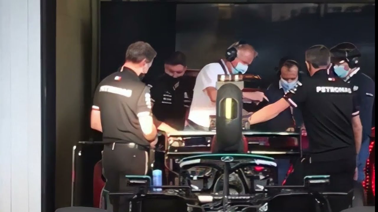 FIA Scrutineers checking the legality of Lewis Hamilton's DRS and rear wing - 2021 Brazil GP