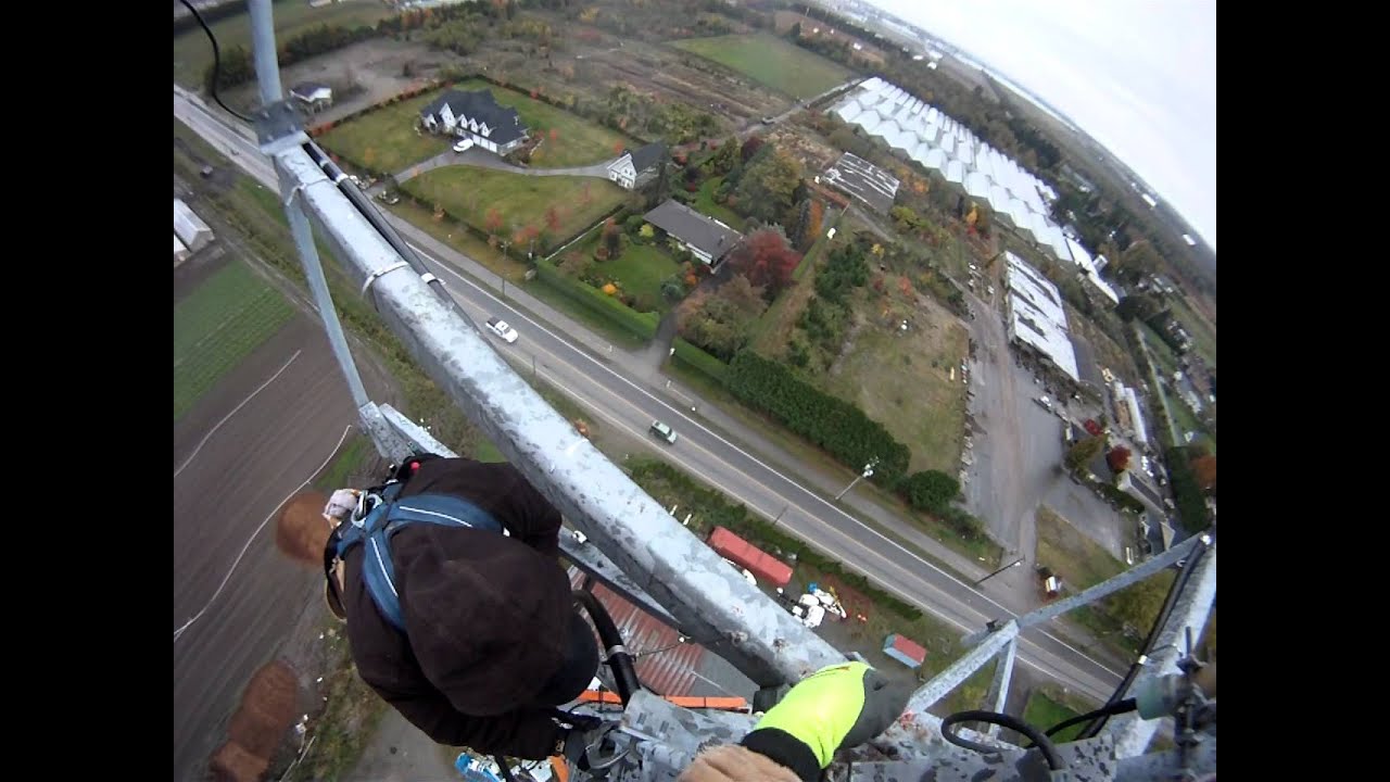 Relamping tower lights 1 0f 2  Pacificrigger and crew working at extreme heights