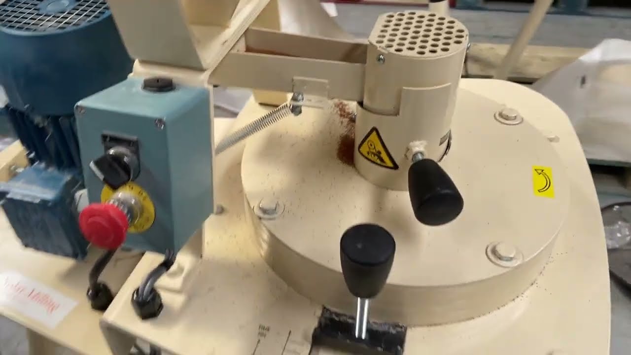 Grinding brown Teff grain with the Zebra Mill, by Solar Milling