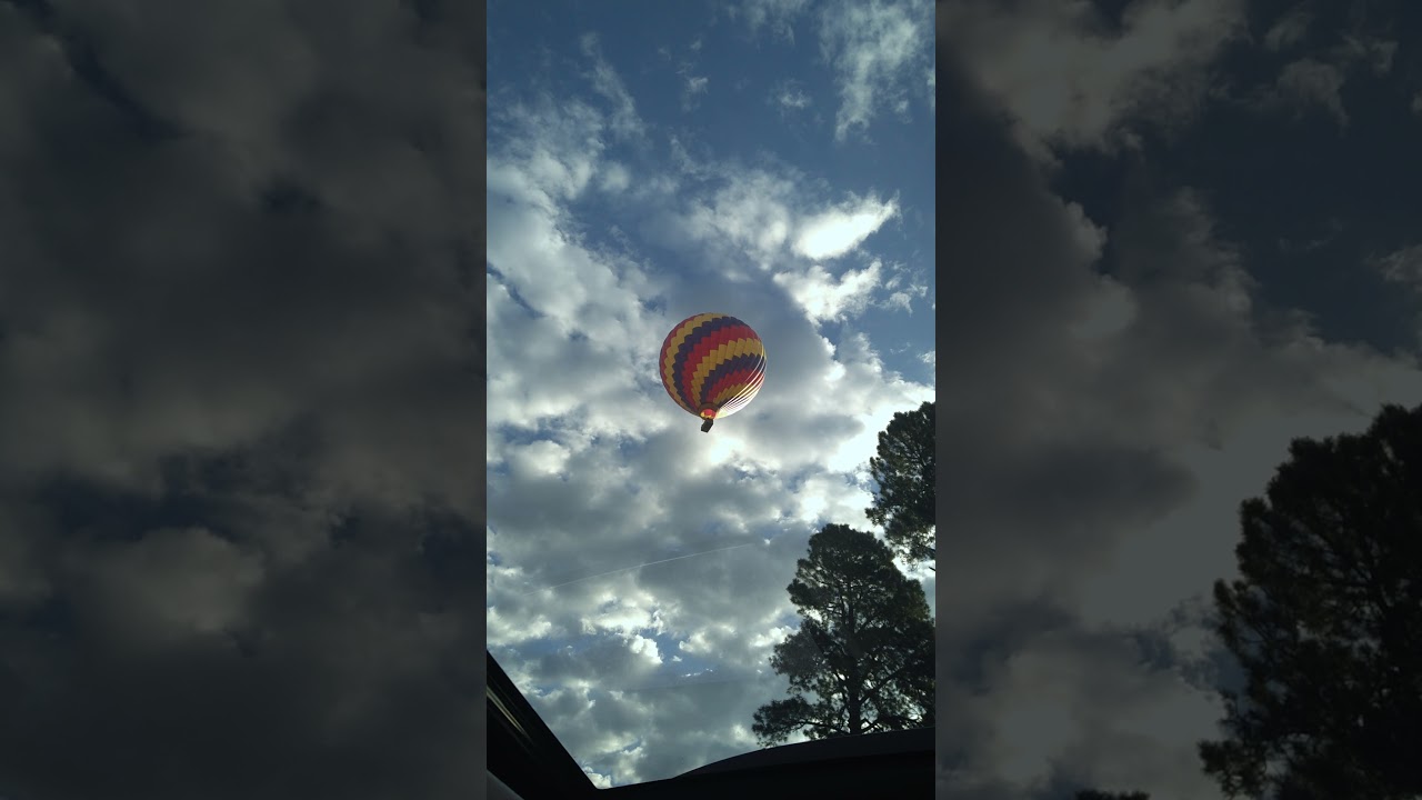 Iris Sapphire Ren&eacute;e Mathews watching a hot air balloon take off! 9/14/2021 2.5 years old