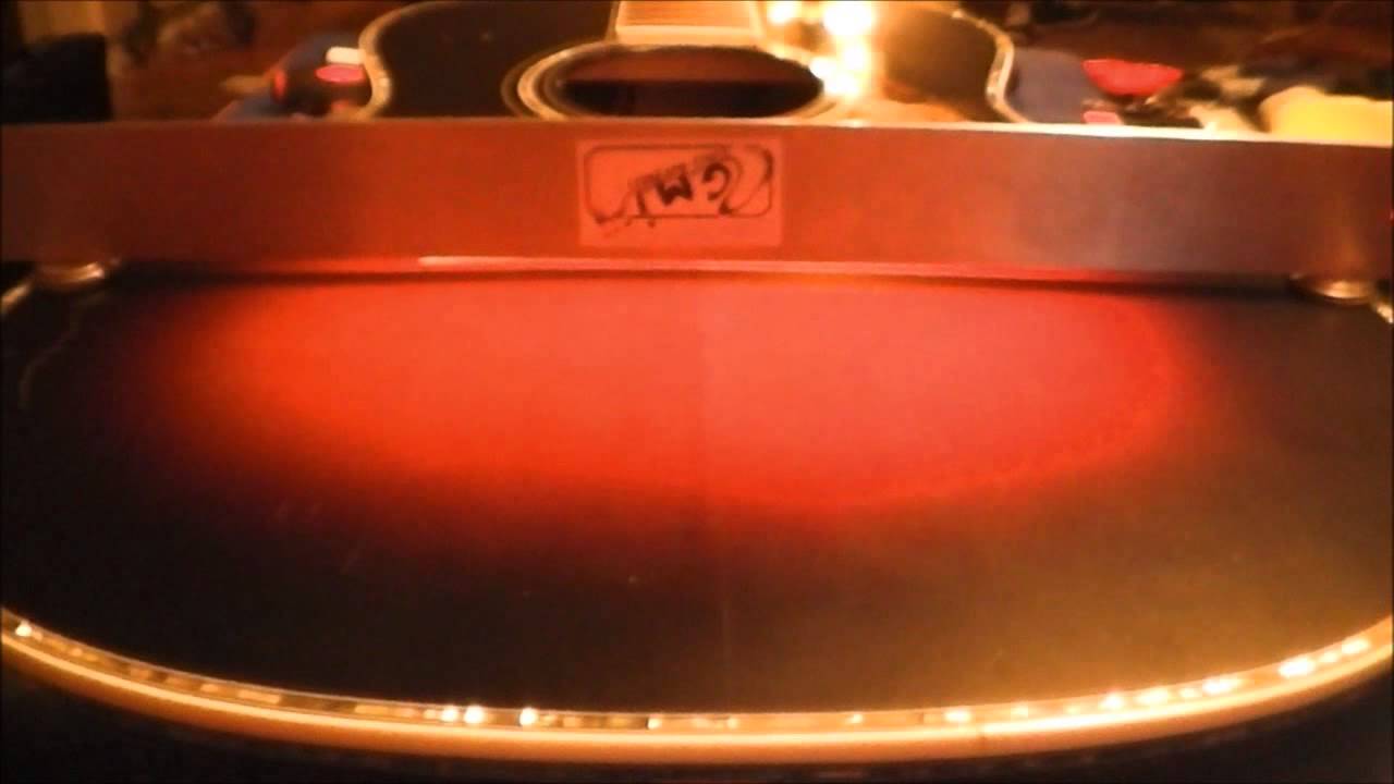 Guitar Repair Bridge Removal and Belly bulge Repair part 2