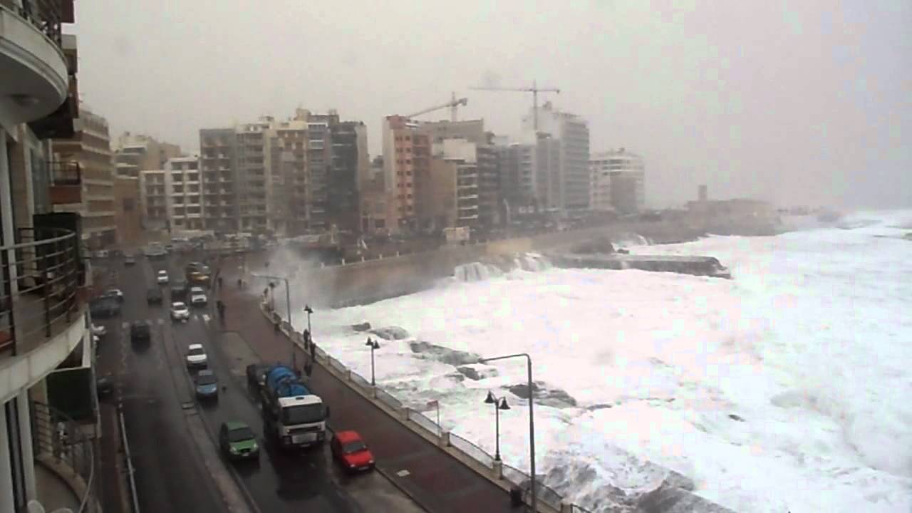 Hurricane in Malta...foaming seas on the beach