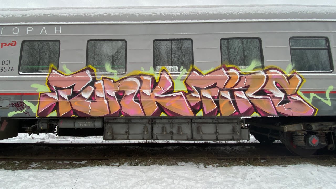 Graffiti bombing on an abandoned train. Handstyle/tagging.Rebel813