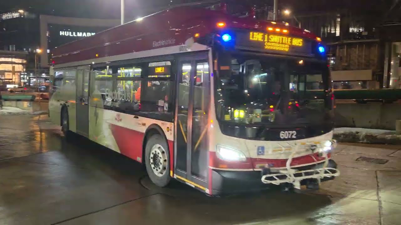 TTC Line 1 shuttle bus action at Sheppard-Yonge station. 