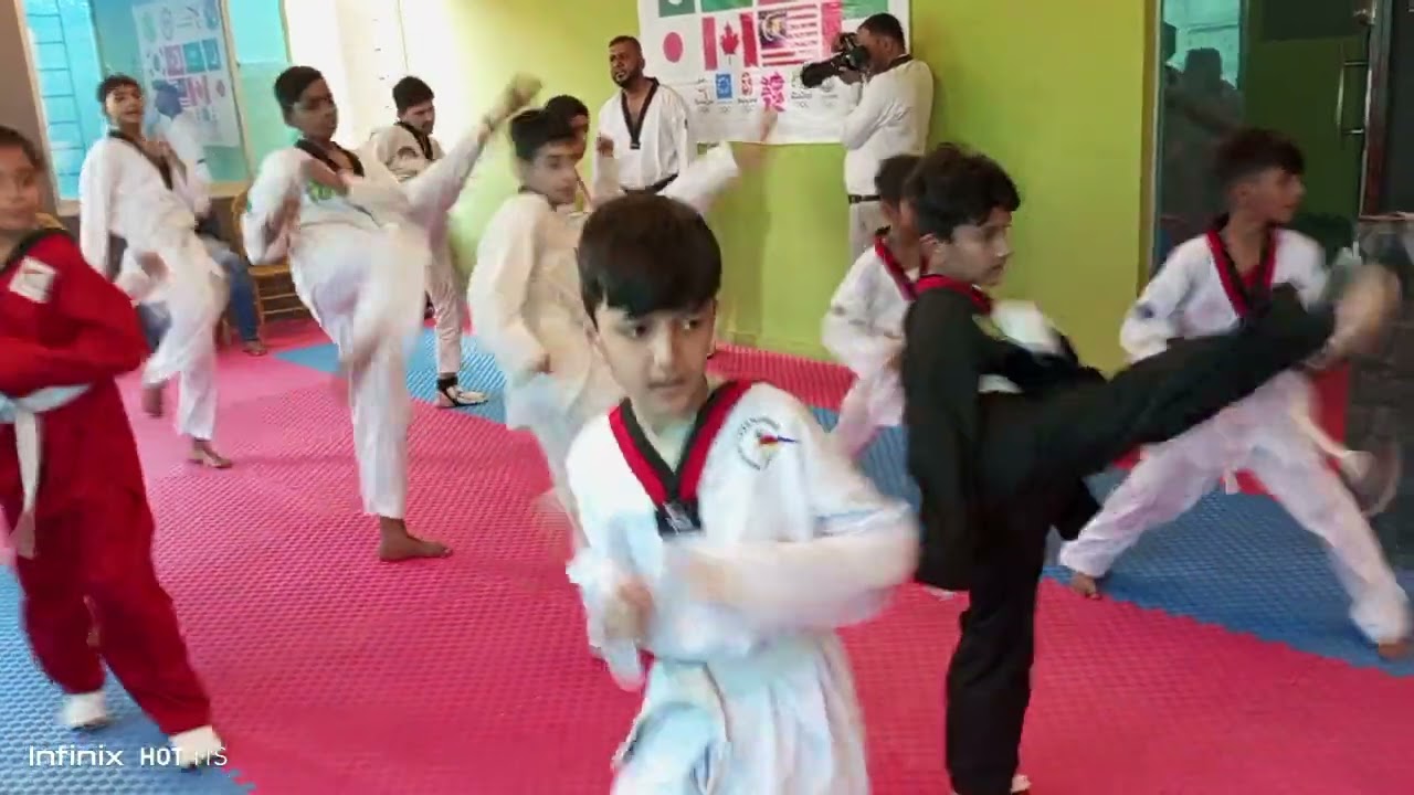 Karachi Taekwondo Academy's belt promotion ceremony assembly kicks 4
