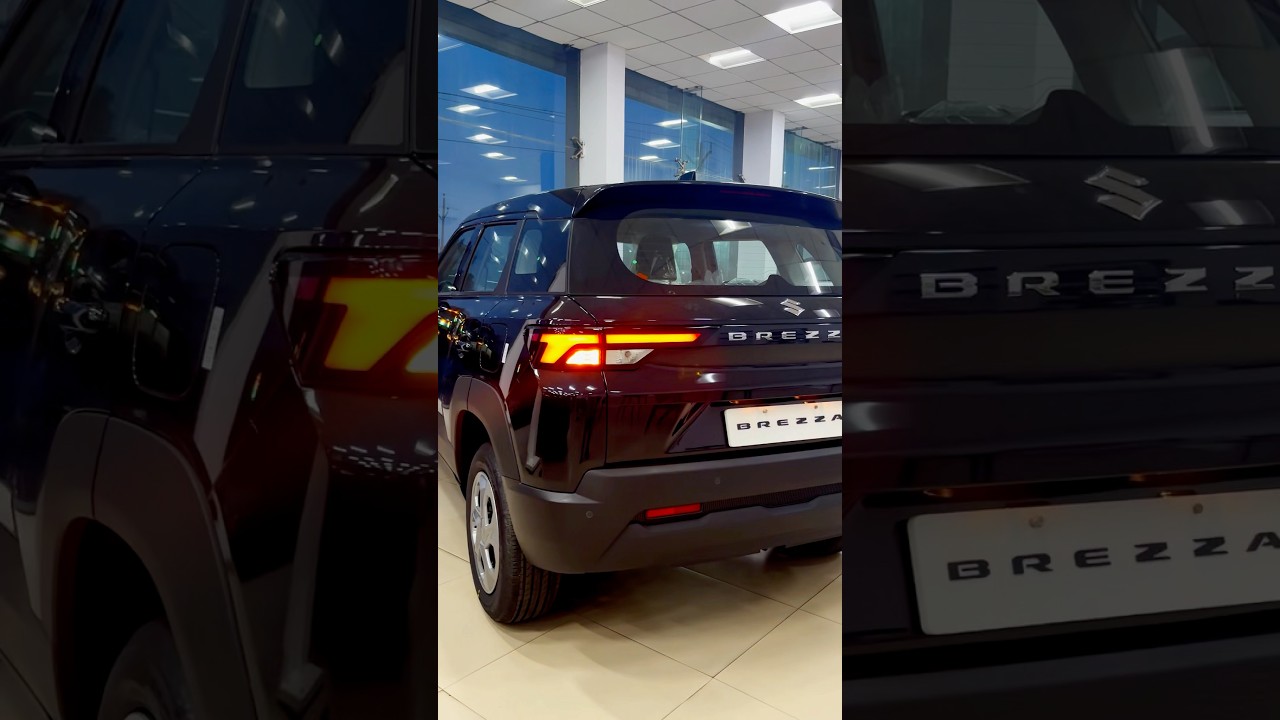 Black SUV New Brezza vxi 2025 facelift 6 airbags base kodel se 