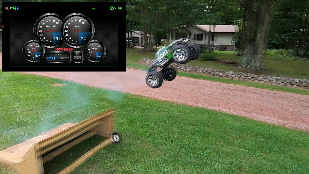 Traxxas REVO 3.3_First Jumps on 45 Degree Ramp!