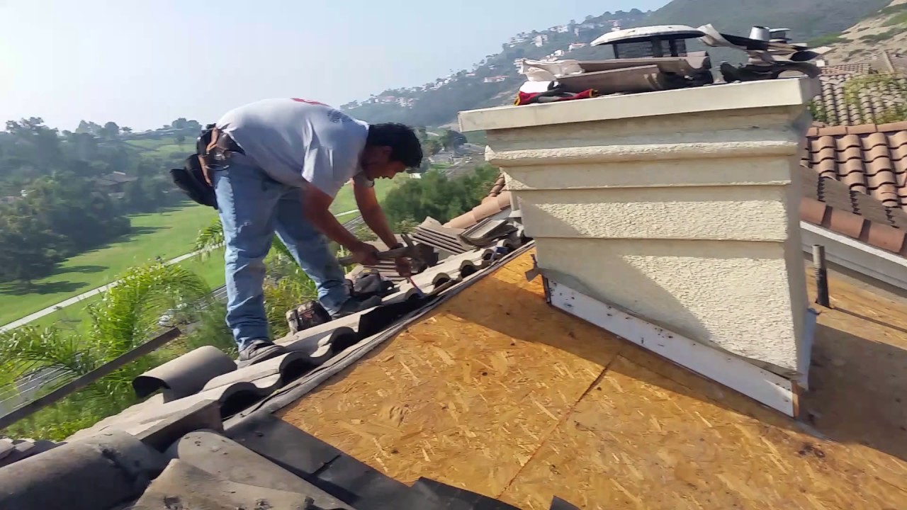 Tile Roof Leak Repair shows how the roof leaks around your chimney on a home in San Clemente, Ca.