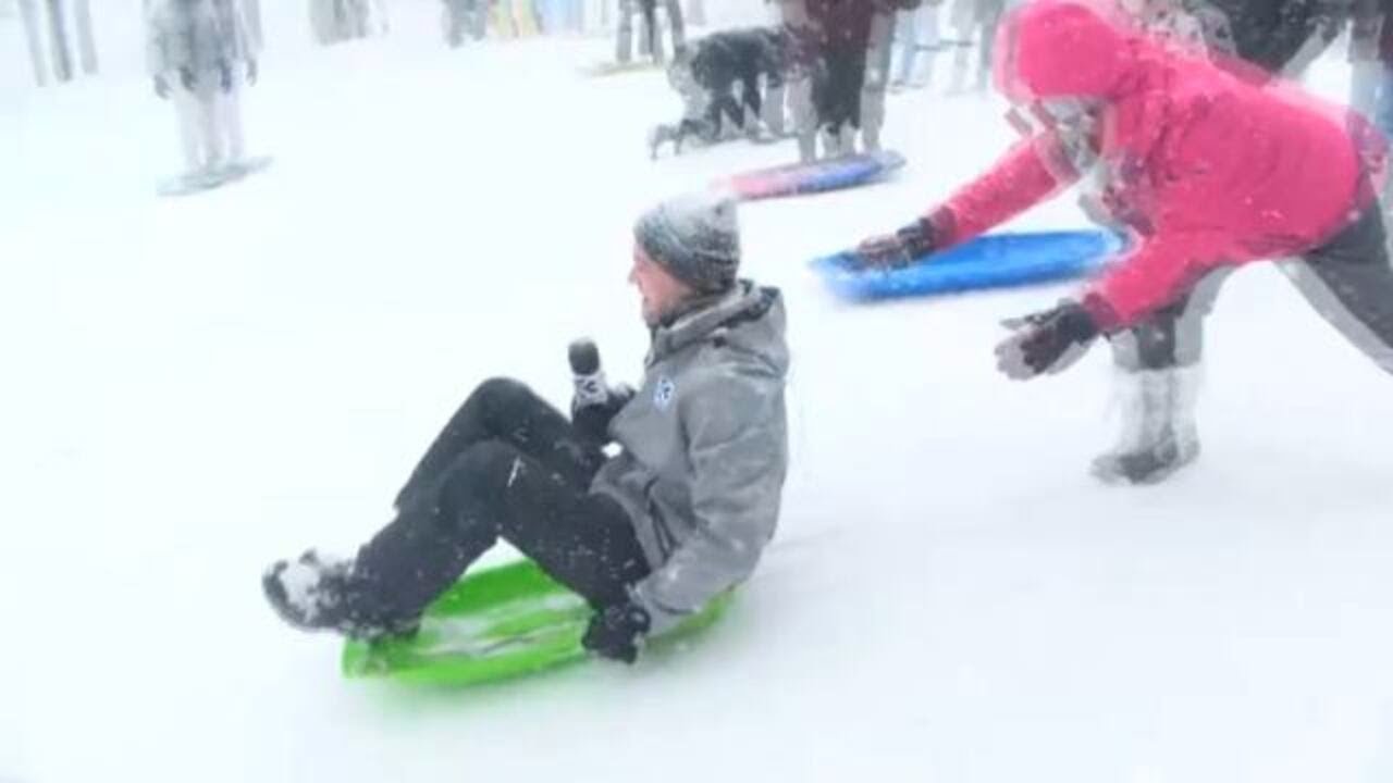 Charlotte reporter joins the sledding fun while live in Huntersville snow