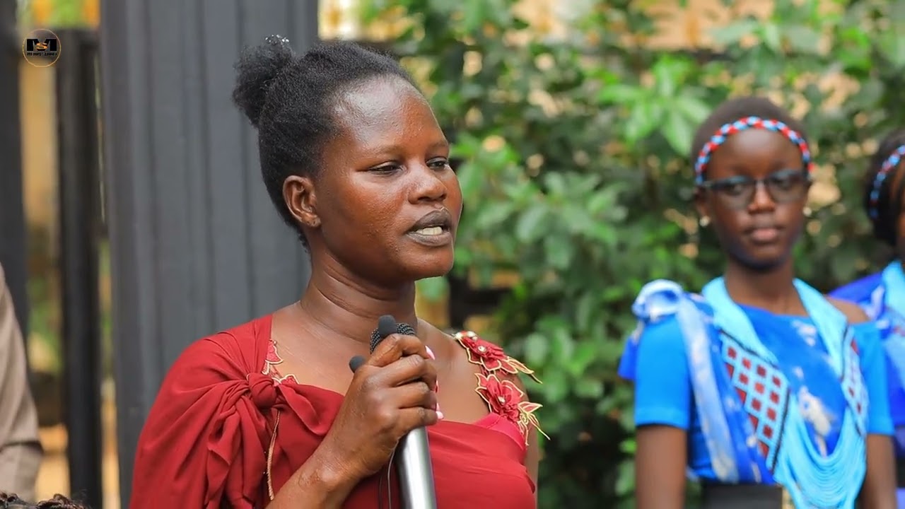 Santino Achain 02 welcoming and honoring by Collo Community in Uganda