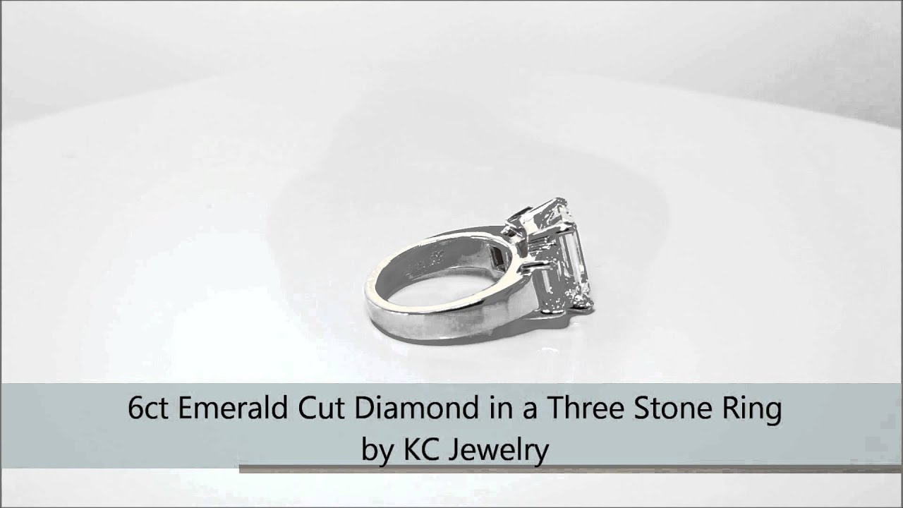 6ct Emerald Cut Diamond in a Three Stone Ring  by KC Jewelry