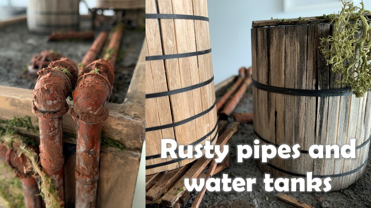 Miniature rusted pipes and wooden water tanks