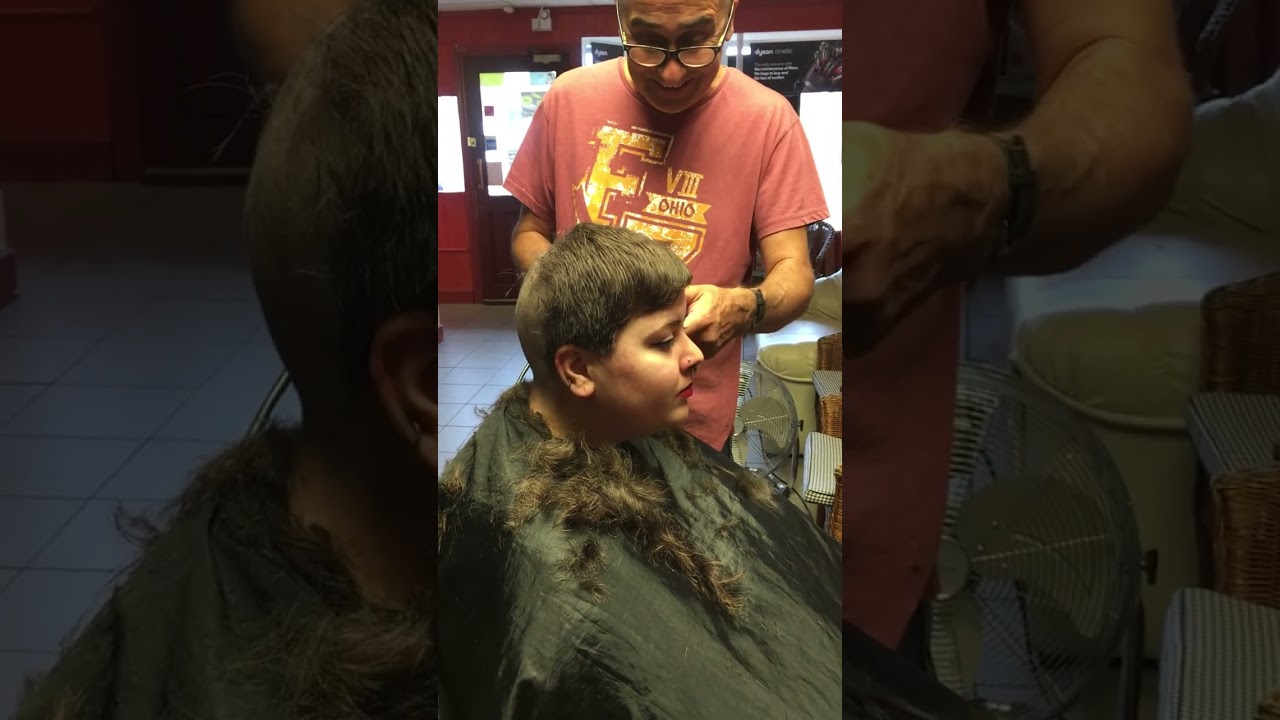 Beautiful woman headshave 