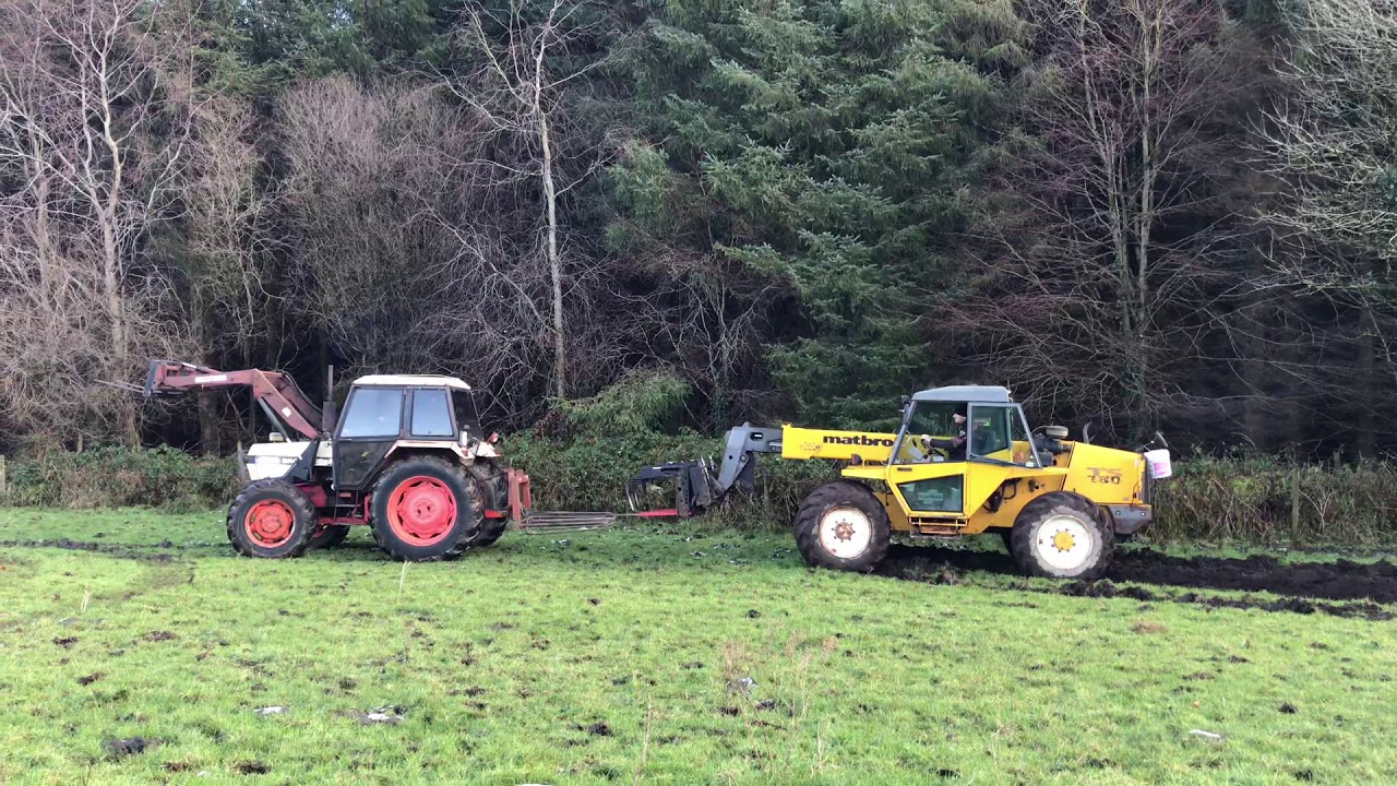 1390 David brown pulling a matbro ts 280 outve thick muck!