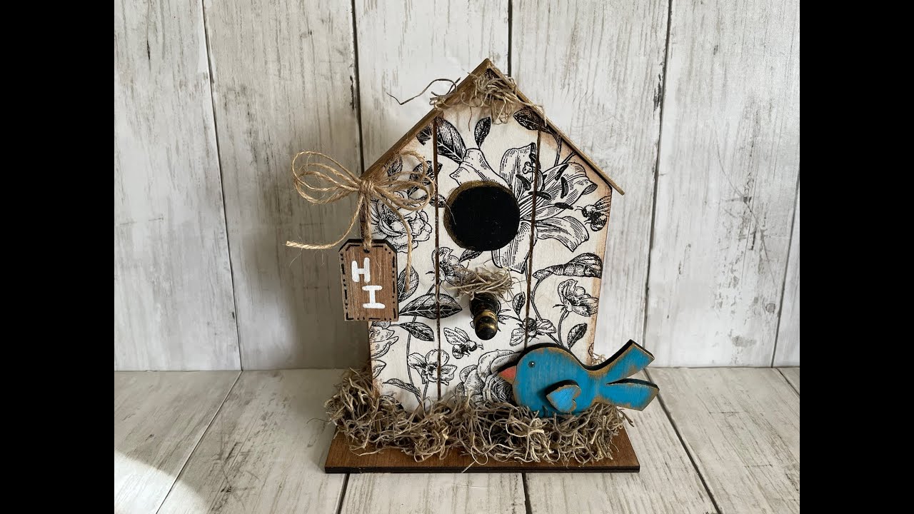 Dollar Tree Wood House made into this cute, cute birdhouse!