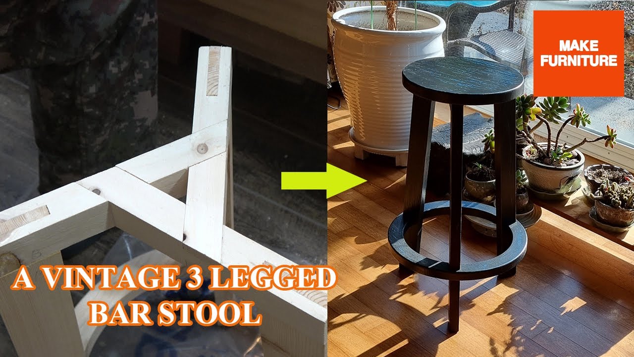 A VINTAGE 3 LEGGED BAR STOOL