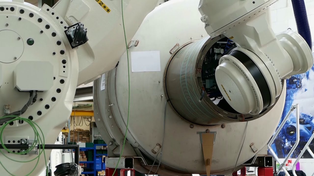 System for high precision assembly of heavy parts, using a FANUC M-2000iA/2300 robot / BEC Robotics