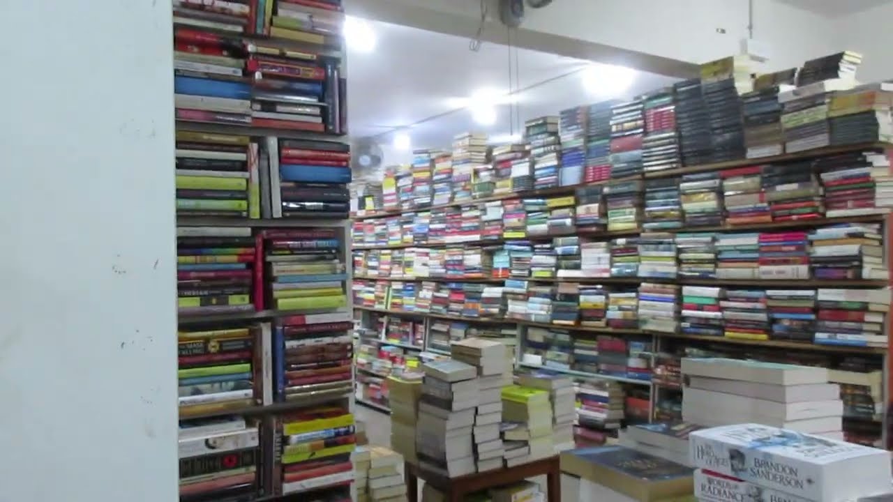 Browsing books & comics at Blossoms, Bangalore