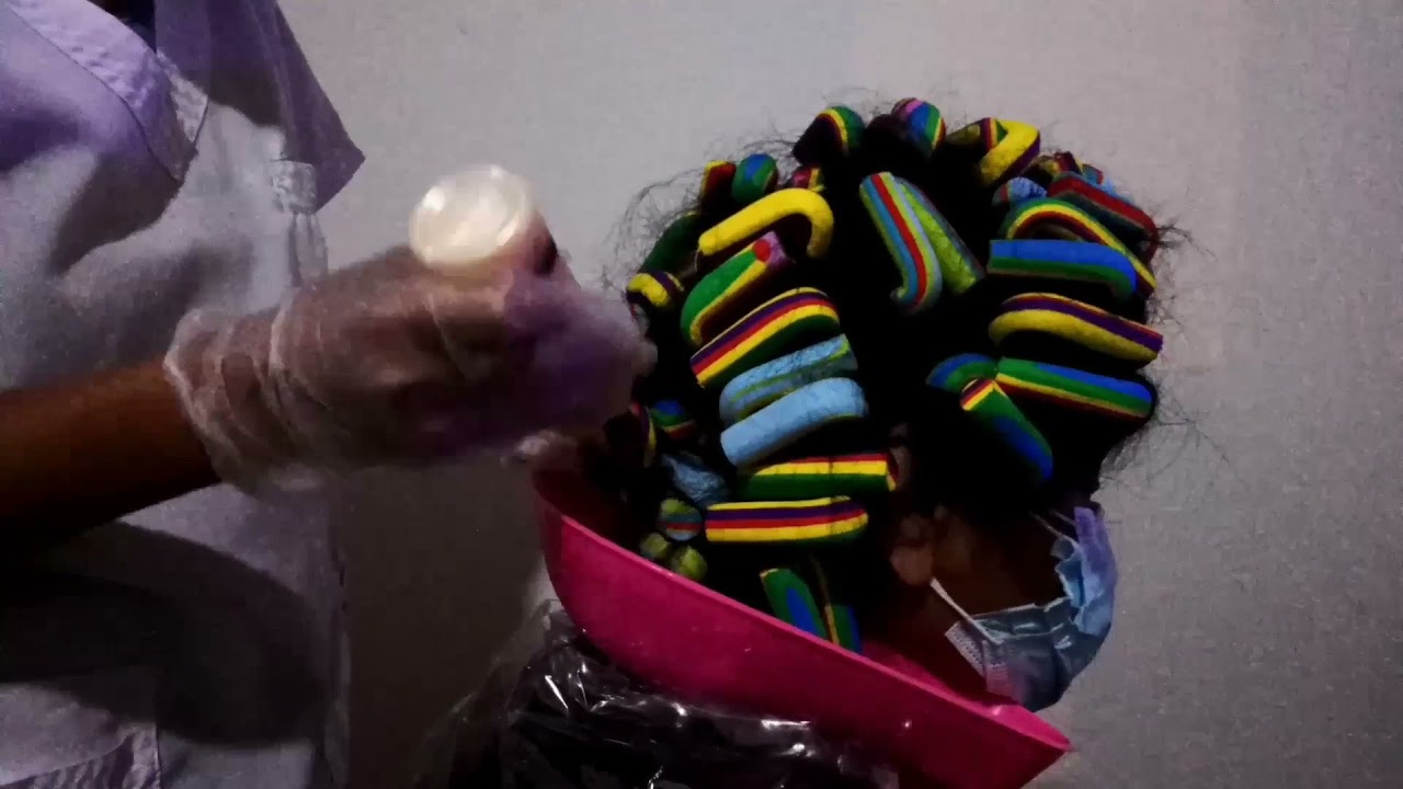 Ondulaci&oacute;n permanente, t&eacute;cnica indirecta con moldes rollers para cabello tinturado.