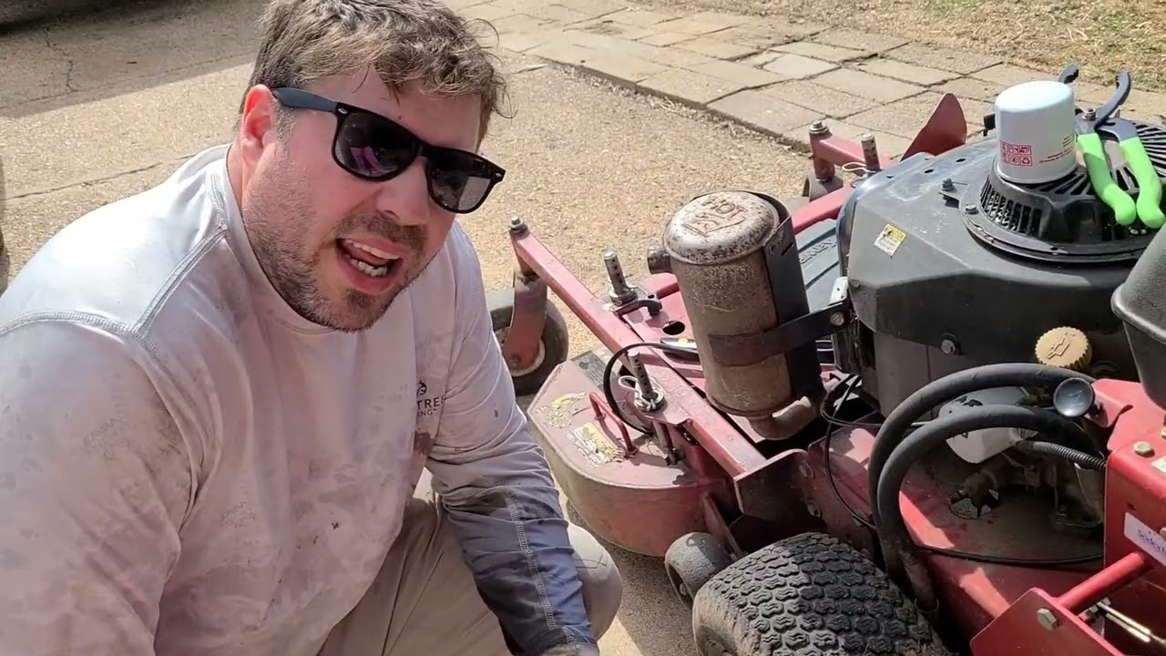 Changing oil in exmark turf tracer HP 36 walk behind commercial mower. spring maintenance.