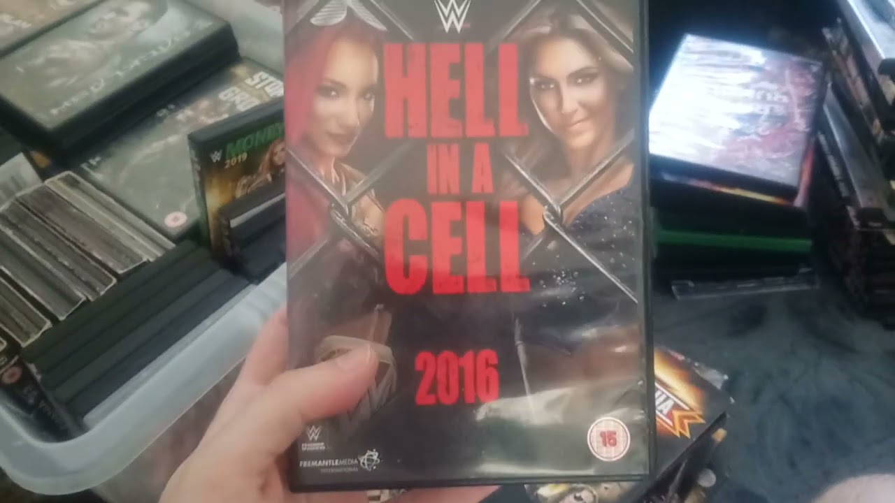 my massive 20 year wwe wrestling dvd collection over 400 titles!